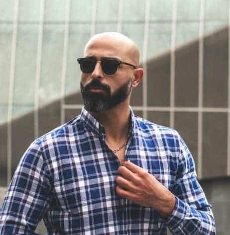short beard and shaved head