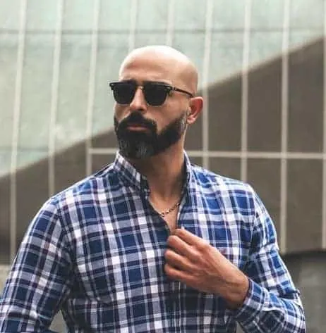 short beard and shaved head
