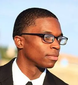 Man in glasses with buzz cut