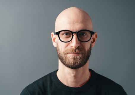 Shaved head with glasses