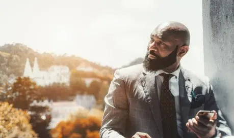 example of a windowpane suit on a bald guy