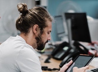 blonde man bun and beard