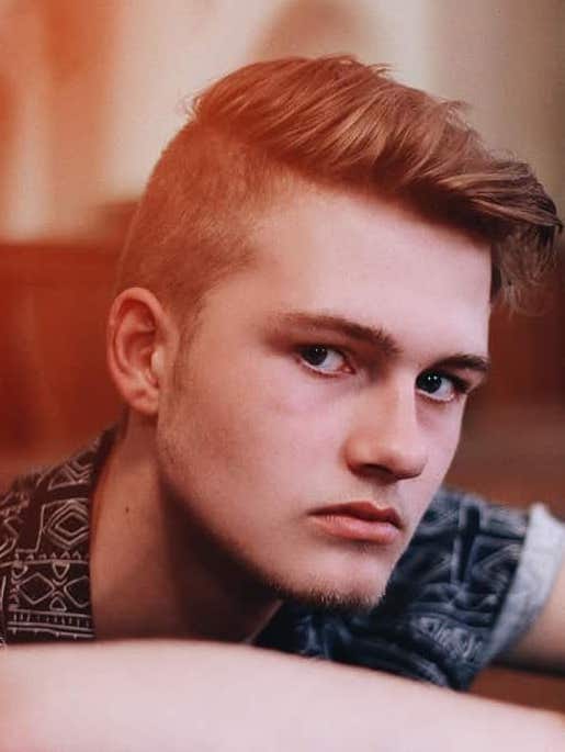 side pompadour with an undercut