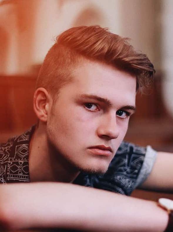 A side pompadour with undercut