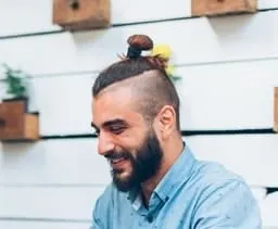 top knot with undercut and beard