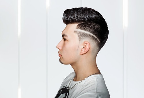 Line design on a classic pompadour