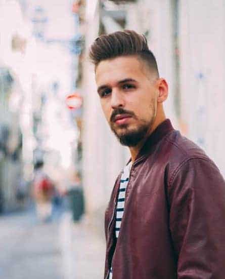 A classic pompadour with mid fade
