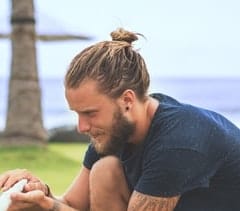 dirty blonde tight man bun