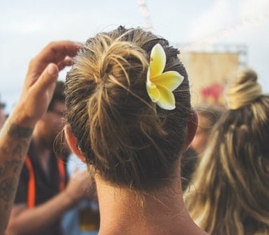 messy blonde man bun