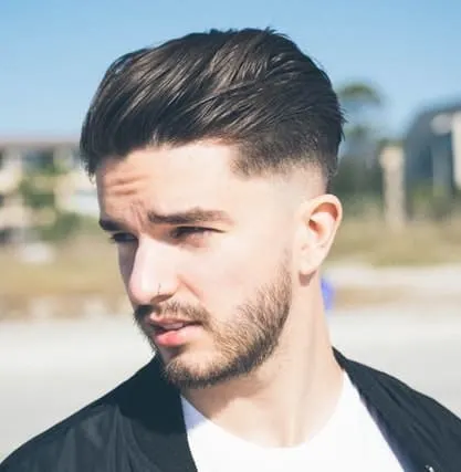 neat pompadour with a mid fade