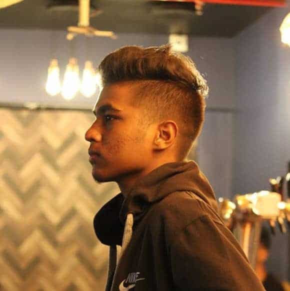 Relaxed pompadour with an udnercut