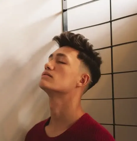 textured quiff with a low fade