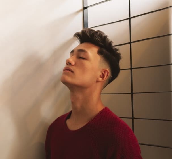 A textured quiff with a low fade