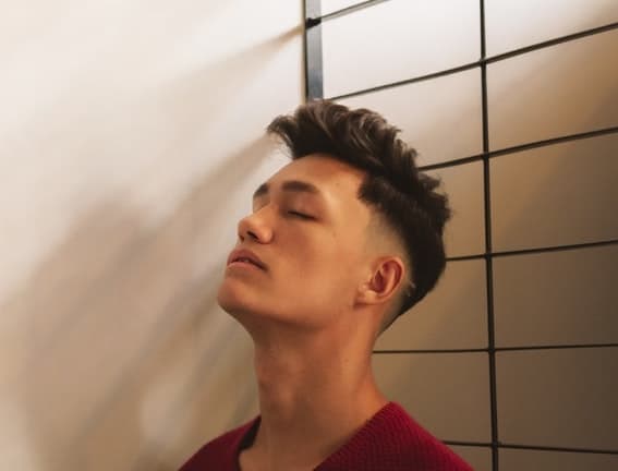 textured quiff with a low fade