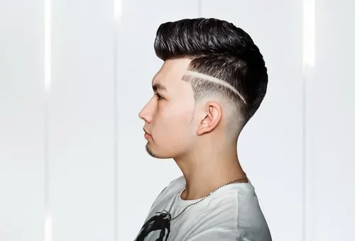 classic pompadour with a line design