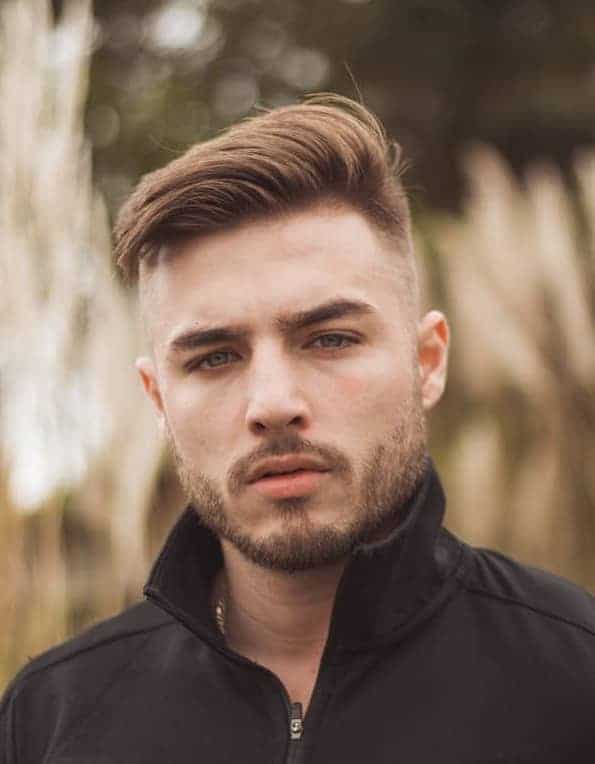 side swept quiff with a mid fade