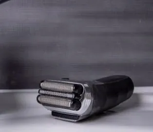 Close-up of a foil electric shaver head
