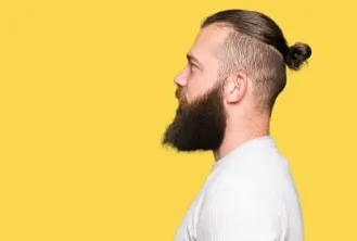 man bun with undercut and beard