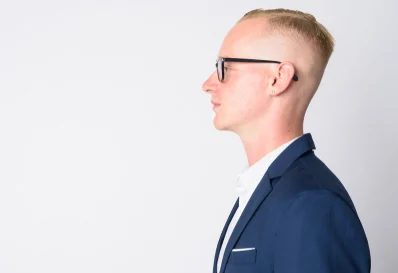 Blonde crew cut with glasses