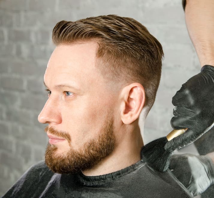 side profile of a man with fade