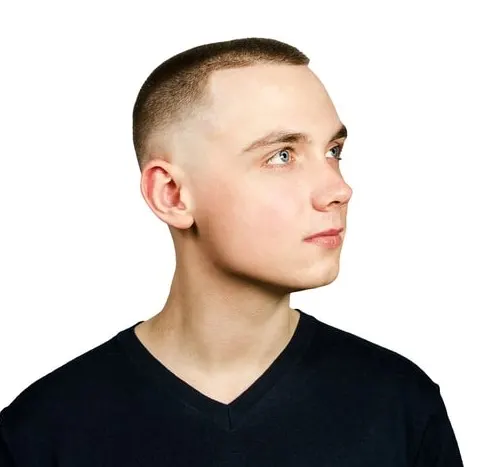 buzz cut with a mid skin fade