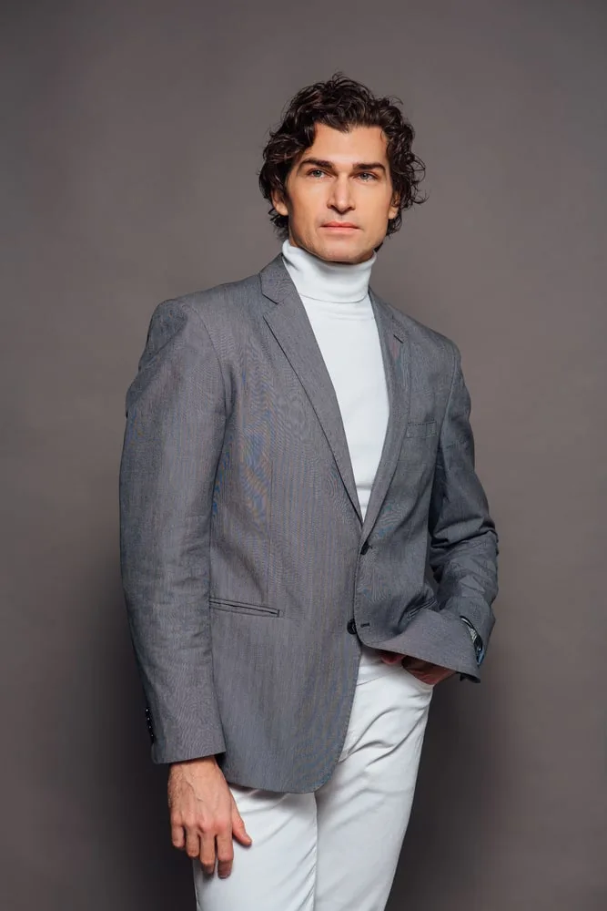grey blazer with white turtleneck