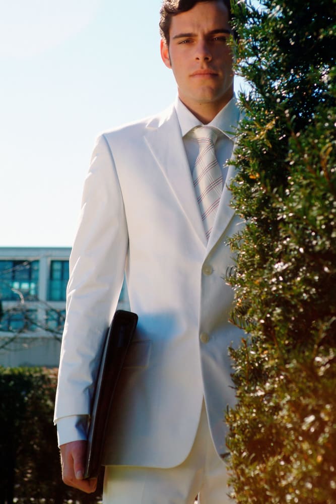 man in white suit 