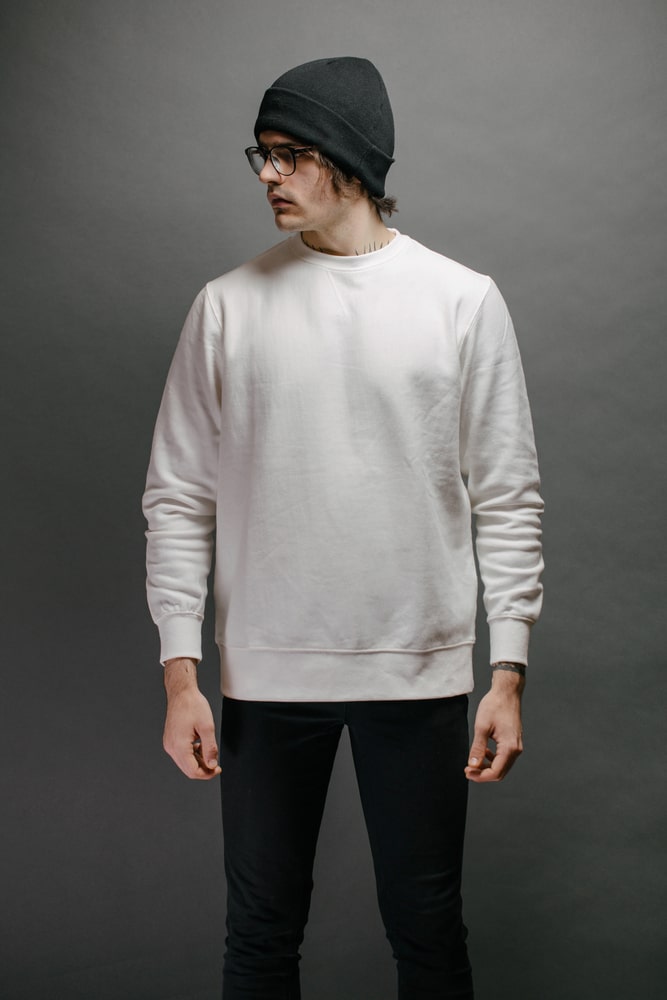 man in white sweatshirt 