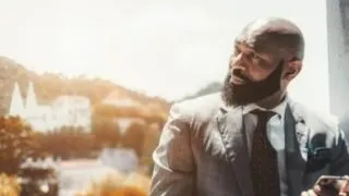 Bald Man In Grey Windowpane Suit Edited