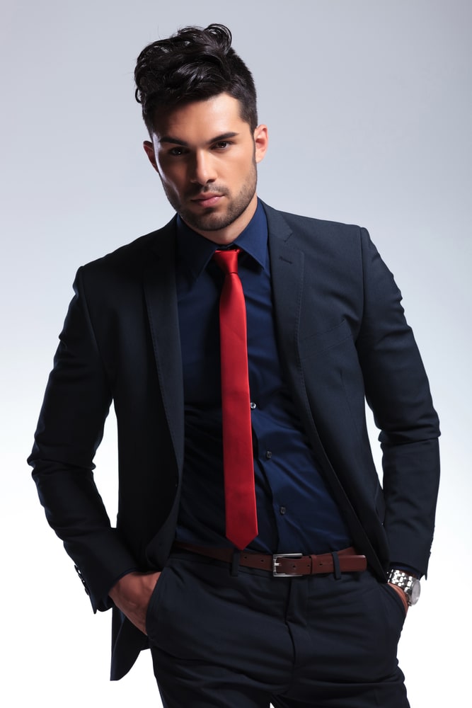 Man In Black Shirt Holding Red Tie Around His Neck Stock Photo  Download  Image Now  iStock