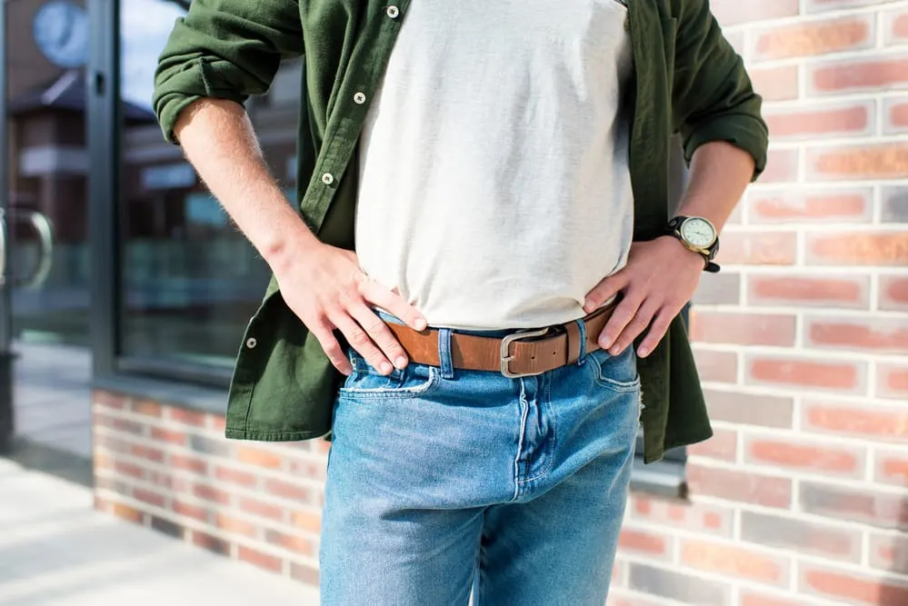 blue jeans and brown belt 