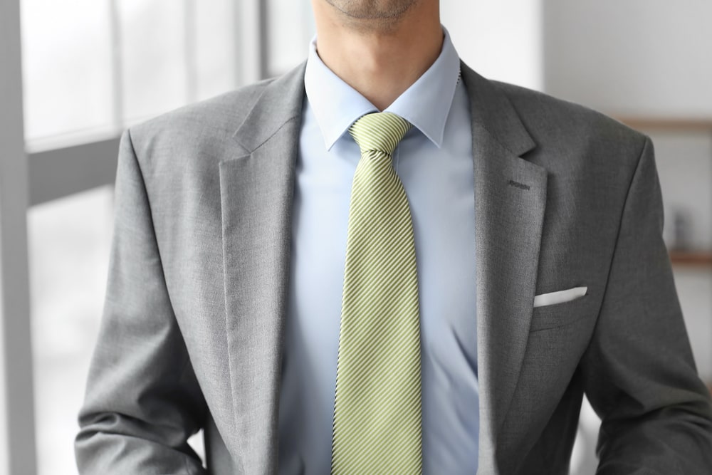 green shirt with green tie 