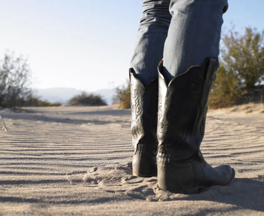 black cowboy boots with jeans