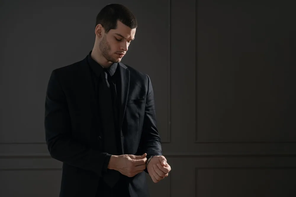 black shirt and suit