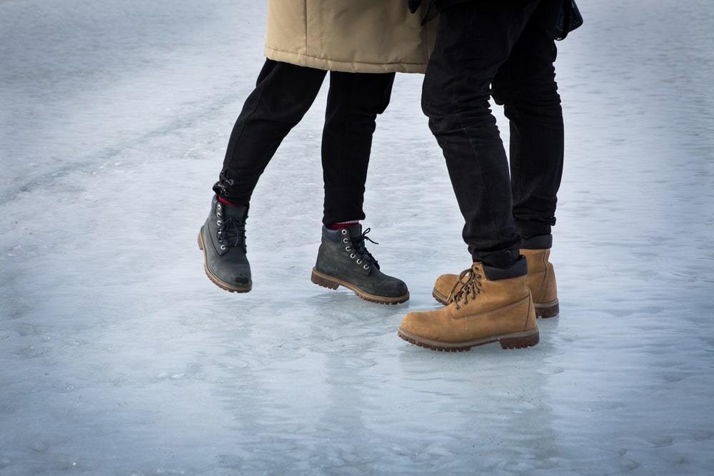 brown boots with black cuffed jeans 