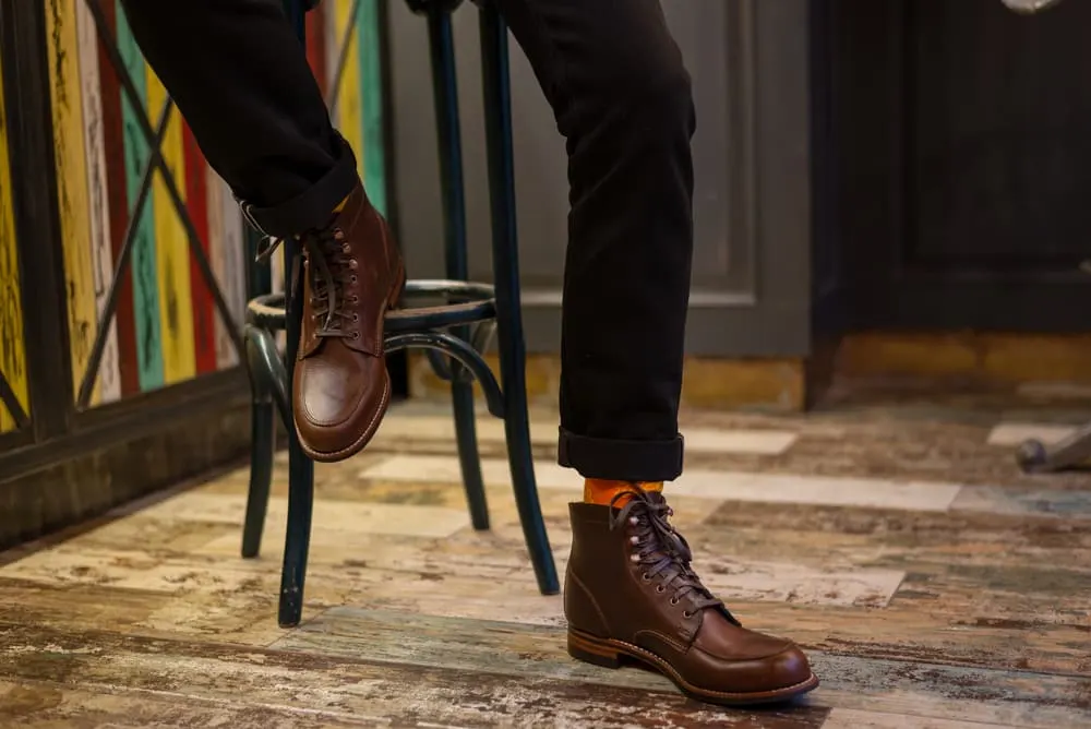 brown workwear boots with black jeans 