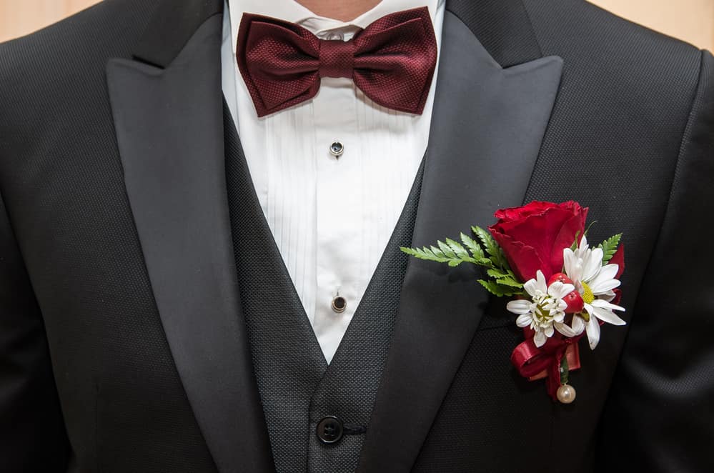 tuxedo with red bow tie