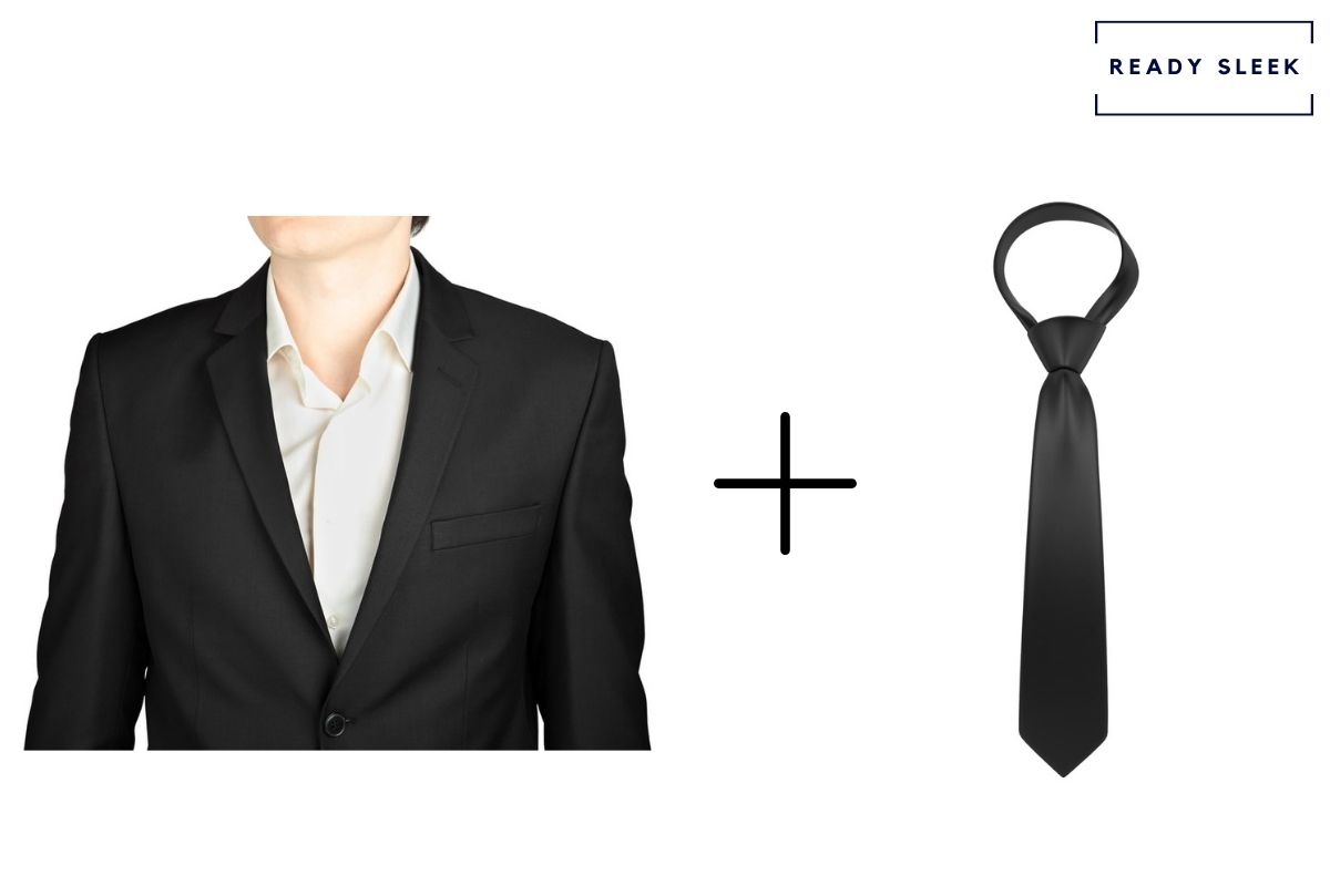 Black suit and white shirt with black tie