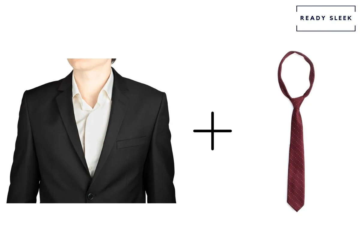 black suit and white shirt with burgundy red tie