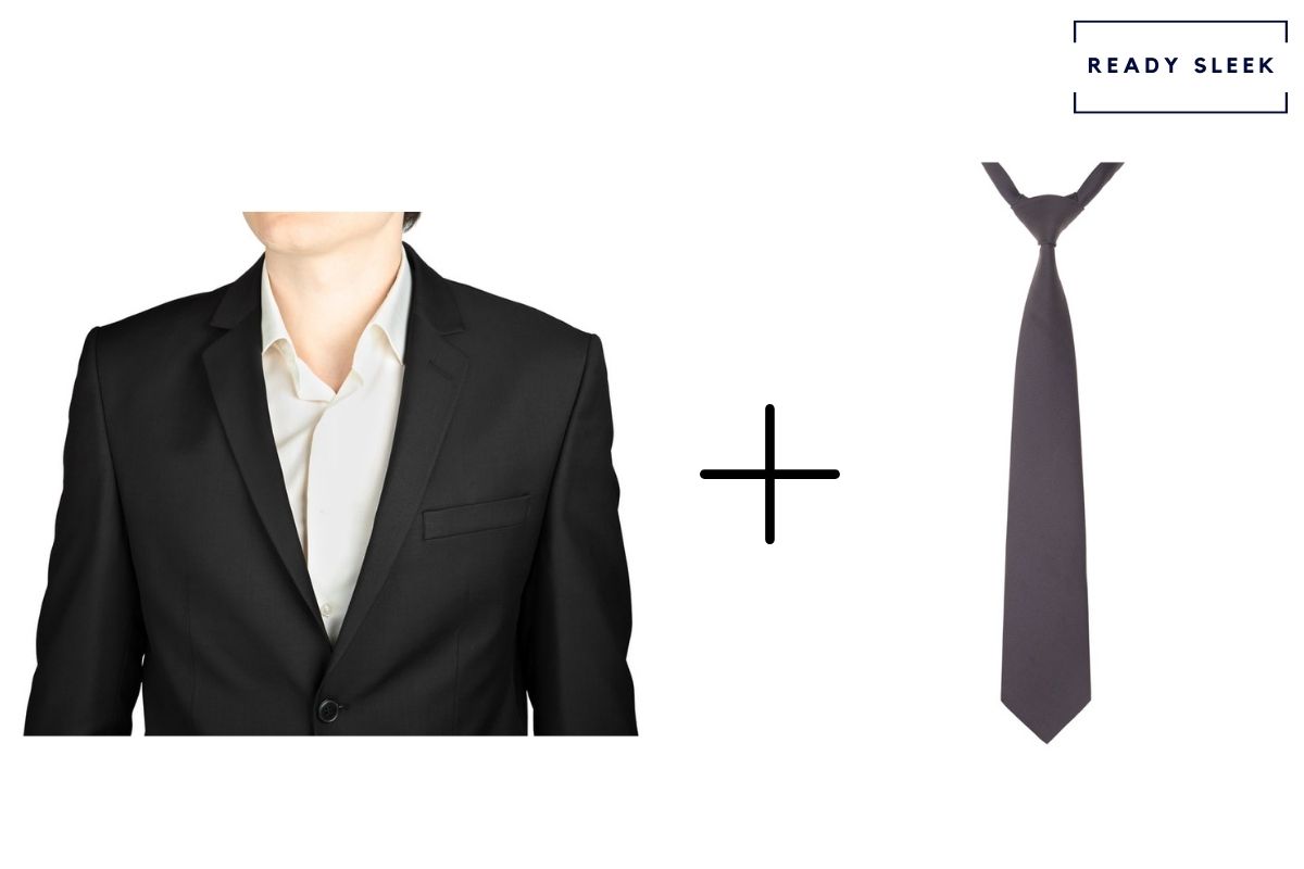 black suit and white shirt with plum purple tie
