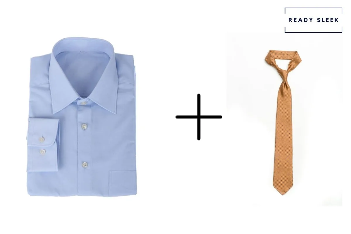 light blue shirt with orange tie