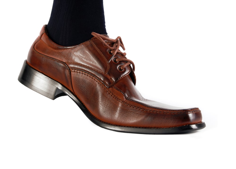 black socks and brown laced shoes