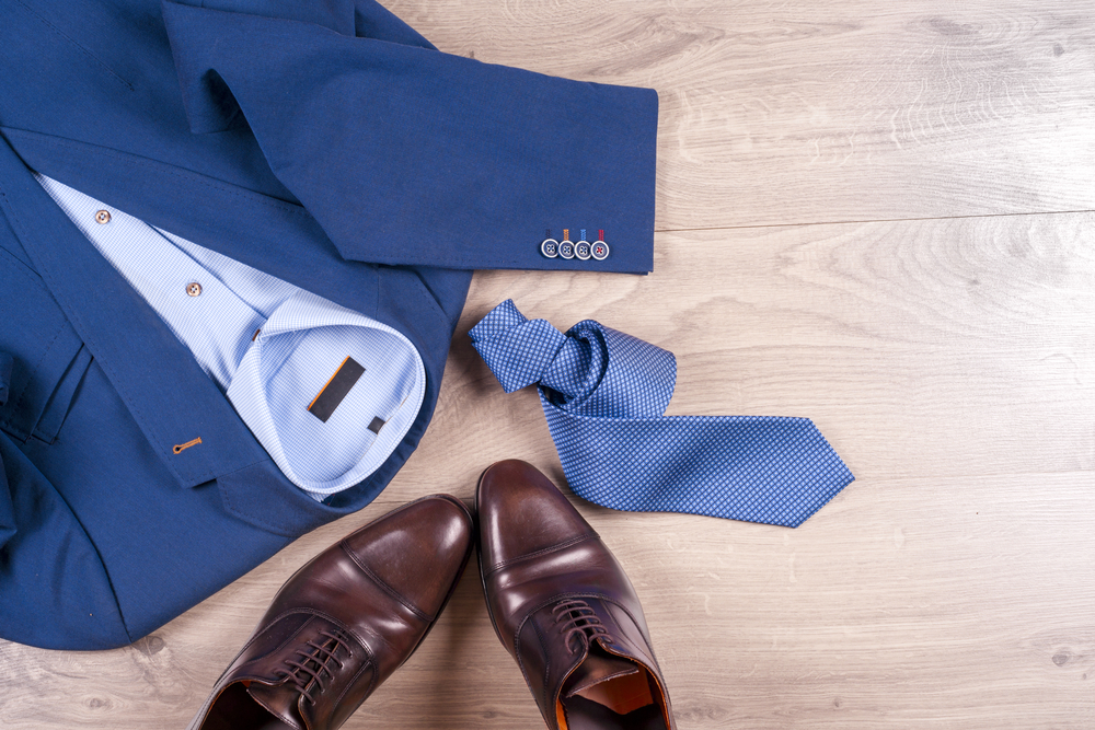 blue suit brown shoes blue tie
