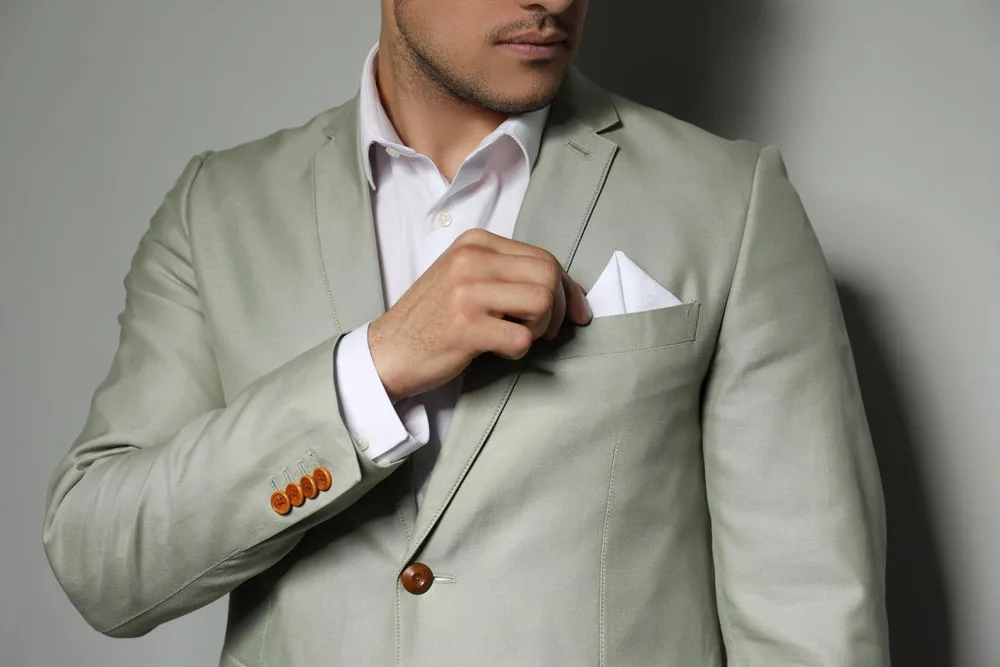 man in light grey suit