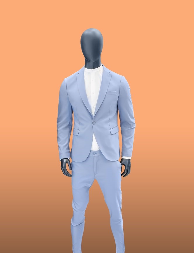 collarless dress shirt with blue suit