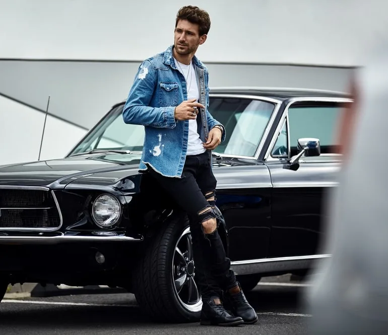 distressed denim jacket and white t shirt