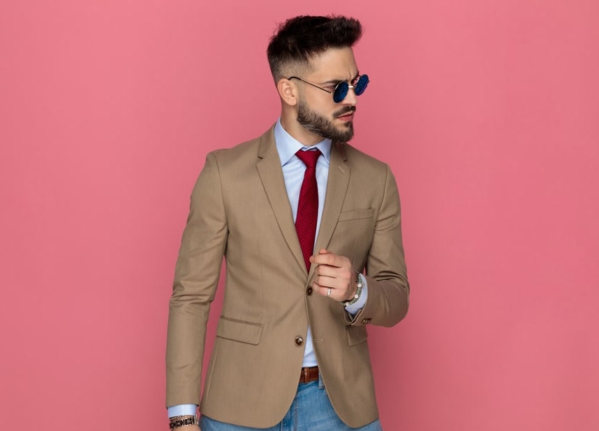 dress shirt with red tie and jeans