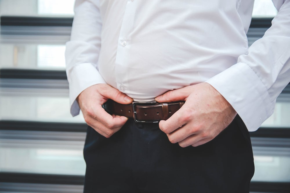 Black suit with brown belt and shoe