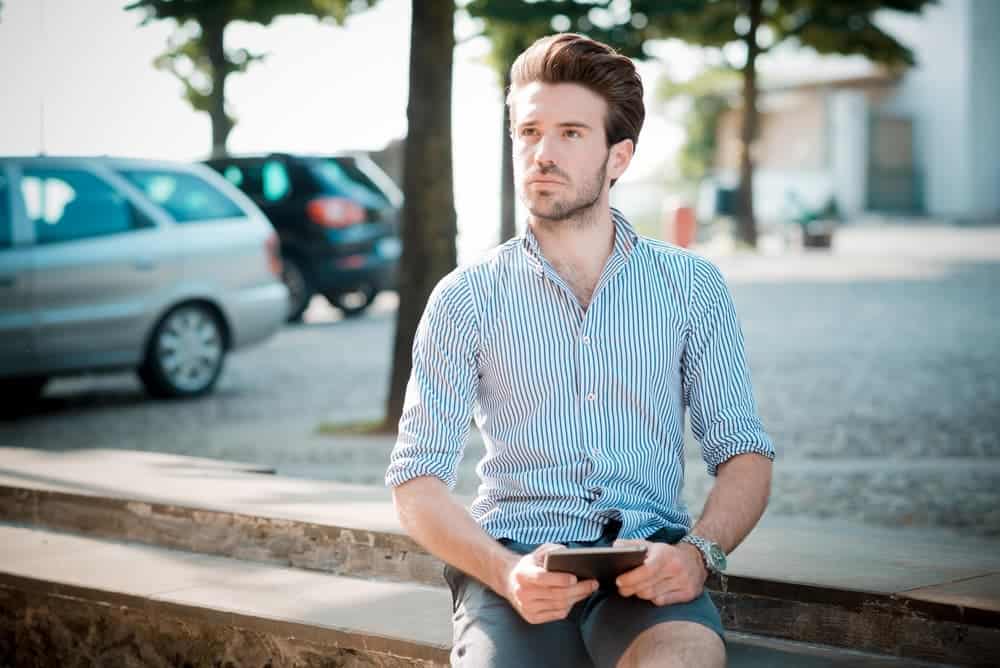 blue shirt with navy shorts