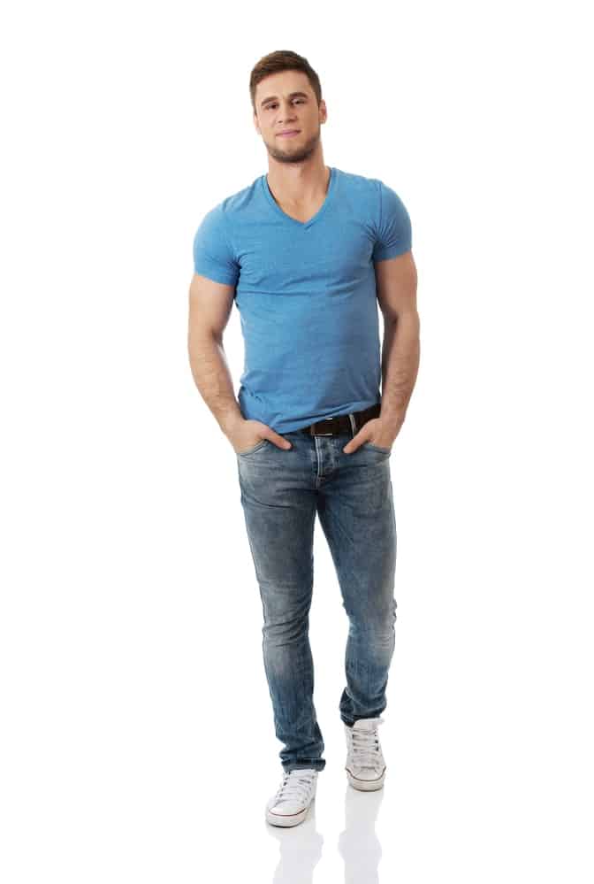 blue t shirt tucked into jeans
